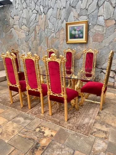Mesa de jantar com 8 cadeiras entalhes de peixe folheada a ouro envelhecido