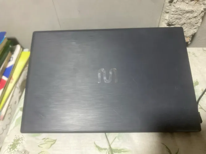 Vendo notebook Ultra, em ótimo estado, 100% funcionando, rodagem lisa e sem travamento.