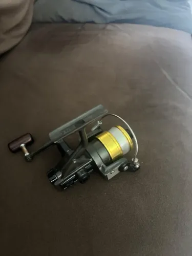 Vendo ou troco molinete daiwa bg 10