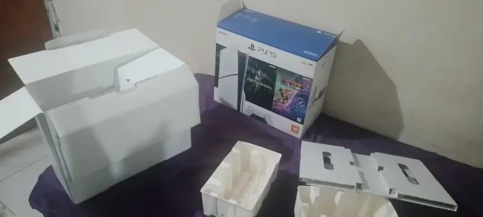 Caixa jogos e acessórios PS5