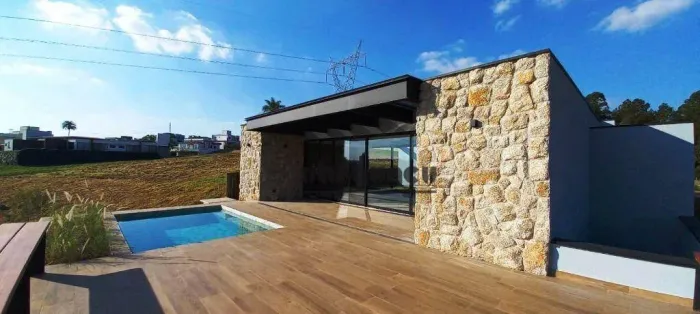 Casa com 4 dormitórios à venda, 296 m² por R$ 3.200.000,00 - Condomínio Villas do Golfe -