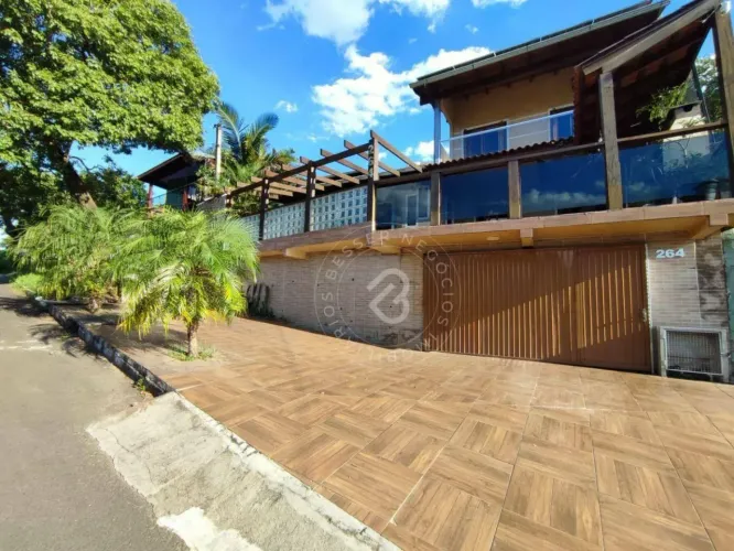 Casa com 4 dormitórios para alugar, 350 m² por R$ 4.570,00/mês - Camboim - Sapucaia do Sul