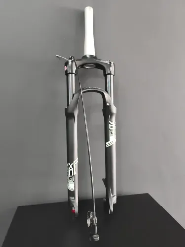 SUSPENSÃO SUNTOUR XCR32 AR E ÓLEO COM REGULAGEM DE RETORNO