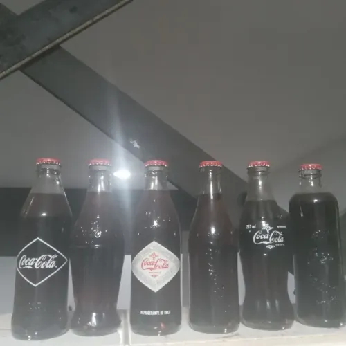 Coleção gGarrafa antiga Coca cola