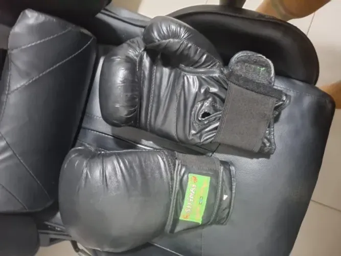 Luvas de boxe e Muay thai
