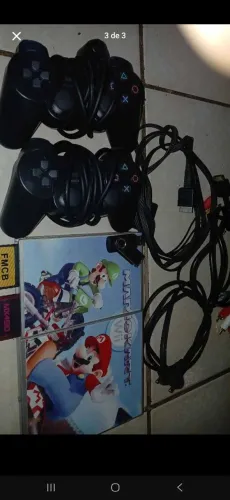 PS2 completo, dois controles, cabos de força+pen-drive com vários jogos?