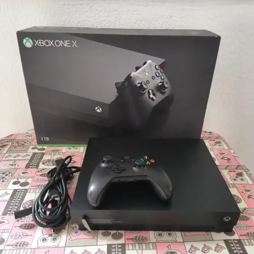 Vendo Xbox one x c/ SSD de 1T