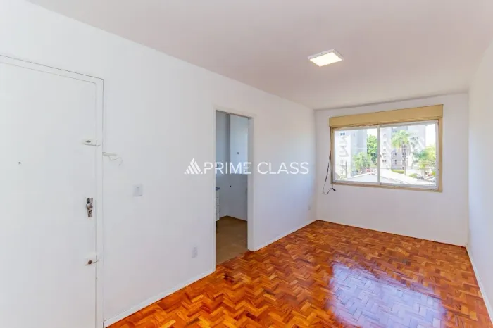 Apartamento 3 dormitórios, vaga coberta, bairro Cristal próximo ao Jockey Club - Porto Ale