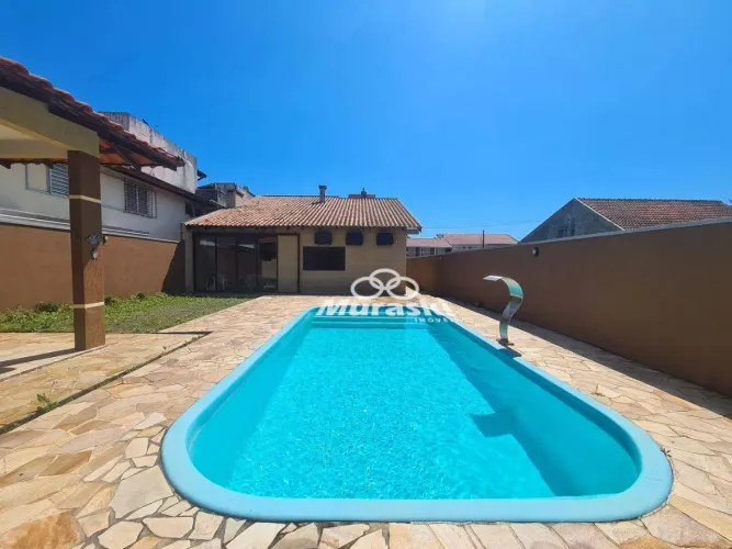 Casa com 3 dormitórios para alugar por dia - Centro - Guaratuba/PR