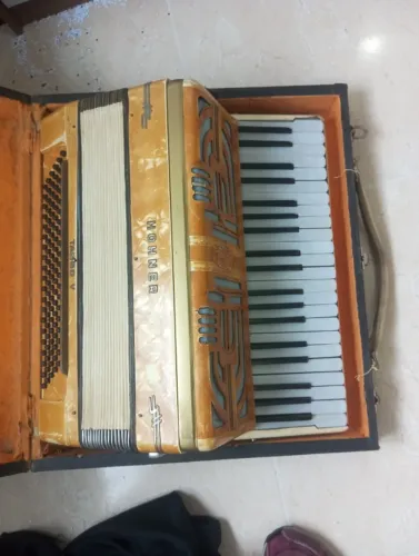 acordeon hohner tango v 120 baixos somente para venda com case precisa afinação