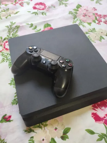 Playstation 4 slim muitos jogos . Pego PS3 na troca