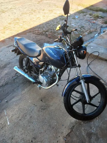 Titan 125 completa