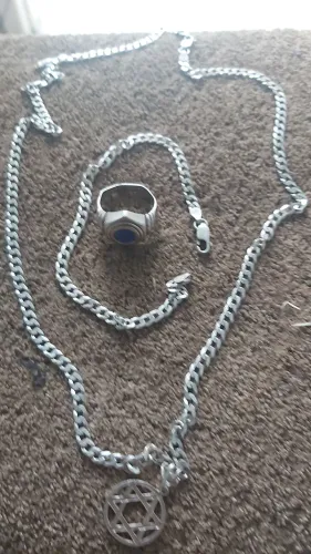 Vendo conjunto de prata,corrente, pulseira e anel com certificado de garantia para polim