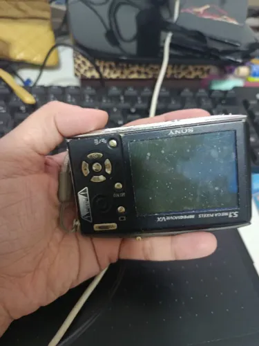 Camera Cybershot usada com defeito