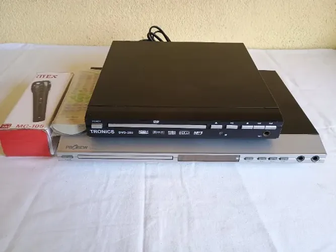 Dois DVD Players sendo um Karaoke ambos funcionando 100% ok