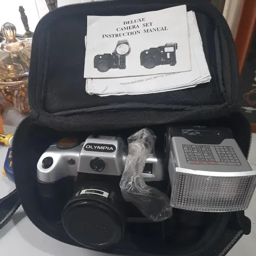 Câmera fotográfica analógica Olímpia DL2000com flash,bols e manual
