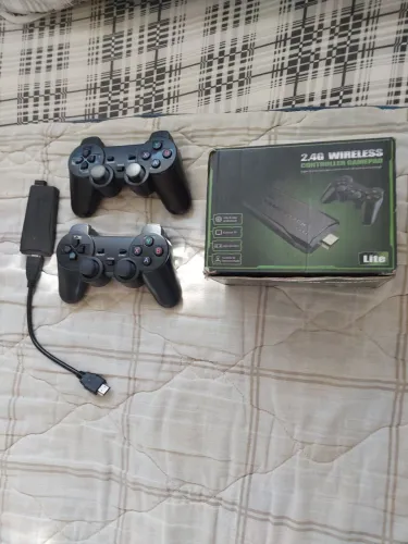 Vende-se Vídeo Game Stick 4k com 20.000 jogos 64 GB 2 controles sem fio