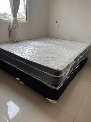 Cama casal de mola