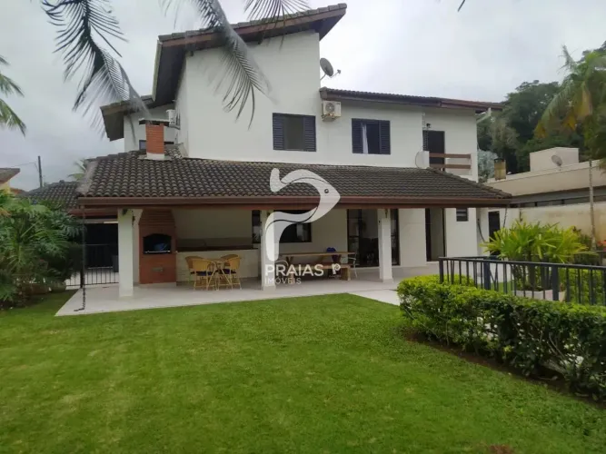 Casa em condomínio fechado com piscina, 4 suítes, Praia do Pernambuco, Guarujá.