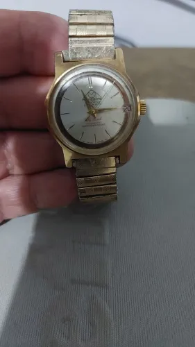 Mondaine automático dourado