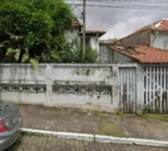 Terreno com casa antiga