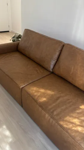 Sofá retrátil em couro legítimo