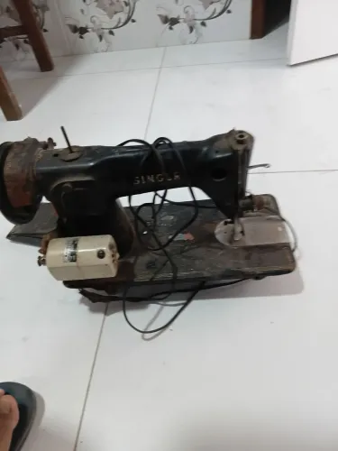 Maquina de costurar da marca singer 