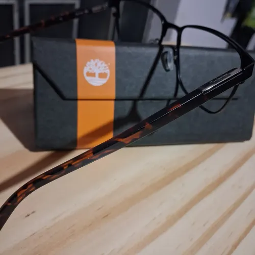 Armação óculos metal masc Timberland