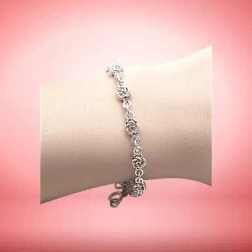 Pulseira de Prata de Bali com 14 Pequenas Rosas Intercaladas Por Elos Redondos
