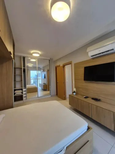 Ed. Unique Studio - Apartamento com 70m², 2 quartos (sendo 1 suíte), 2 vagas de garagem,