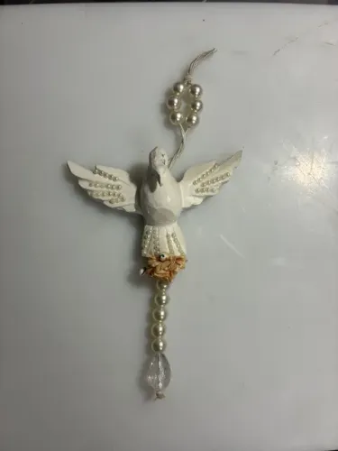 enfeite de parede em resina espirito santo 