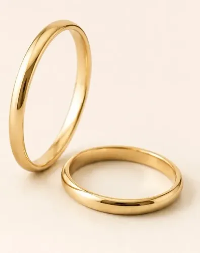 Par de Alianças Abauladas em Ouro 18k 750