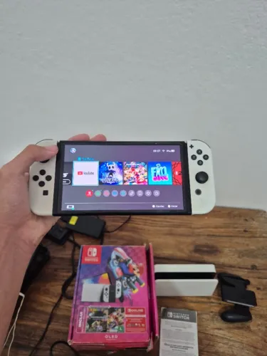 Vendo switch oled 64 gigas + controle + ea fc 25+ nba 2k25
