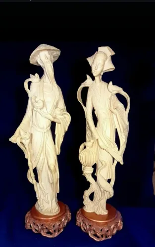 Estátuas de casal oriental 