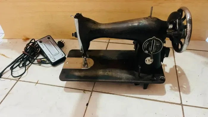 Máquina de constura singer manual