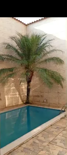 Casa com 3 quartos sendo um suíte, área gourmet e piscina à venda no Residencial Canaã em