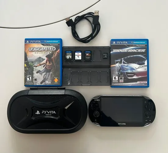 PSVITA MAIS 5 JOGOS PERFEITO ESTADO.