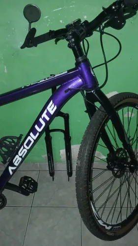 BIKE ABSOLUTE NERO 5 C/ NF, ARO 29 <br>Quadro 19, K7, Freios Hidráulico.