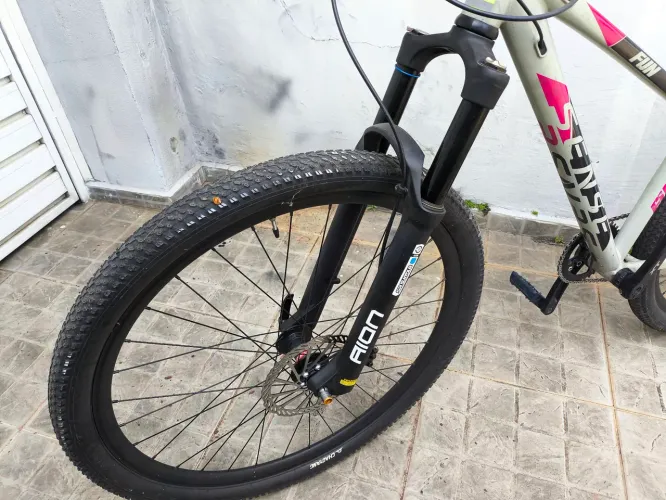 Suspensão SR Suntour AION 32 | Aro 29 | 120mm | tapered | Ar | Óleo| trava