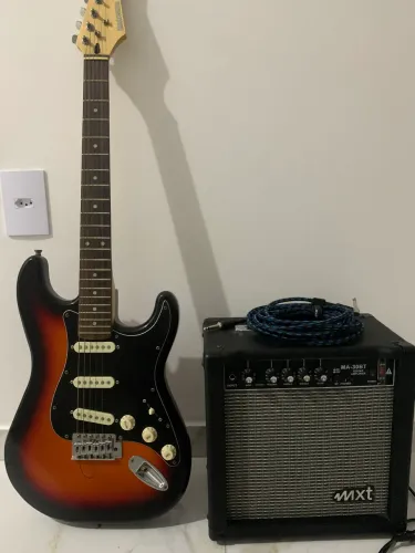 Guitarra + amplificador