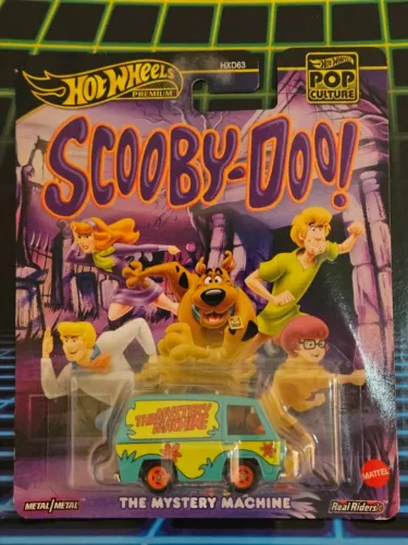CARRINHO HOT WEELS THE MYSTERY MACHINE PREMIUM RODAS DE BORRACHA1:64