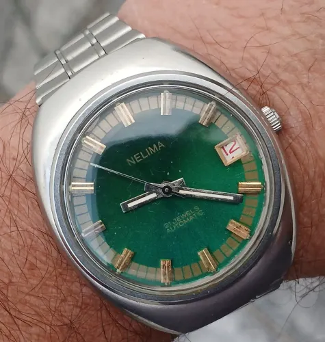 Relógio suíço Nelima anos 70, automático, mostrador  verde, raridade exemplar de coleção. 