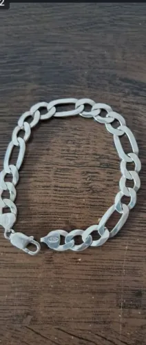 Pulseira em prata 925.pesando 19g.medindo 21cm.