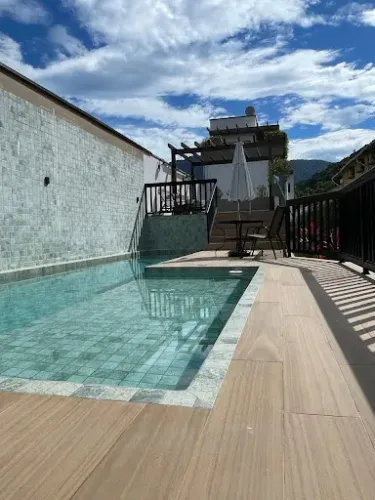 Casa em condomínio à venda em Maresias  3 dormitórios | Próxima à praia | Financiável