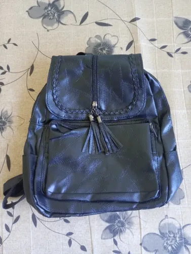 Mochila preta linda para repasse! (Sem uso)