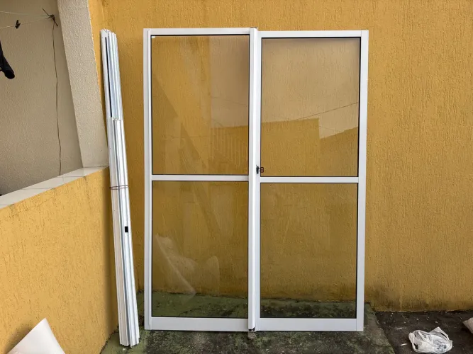 Porta balcão de alumínio 1.55x2.10 seminova. Sem uso