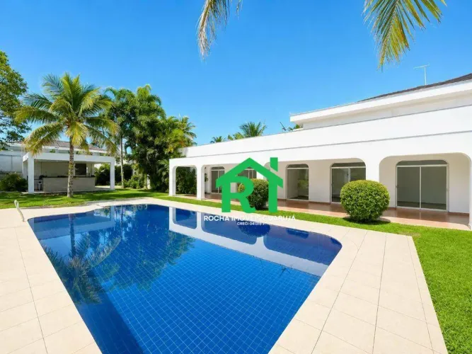 Casa com 4 quartos (4 suítes), 6 vagas e lazer à venda em Acapulco, Guarujá