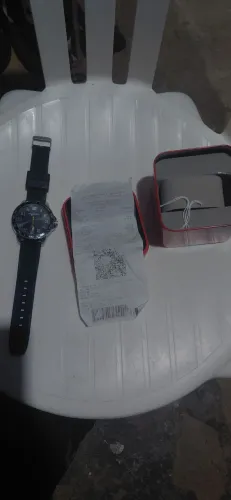 Vendo relógio mondaine na caixa com nota 