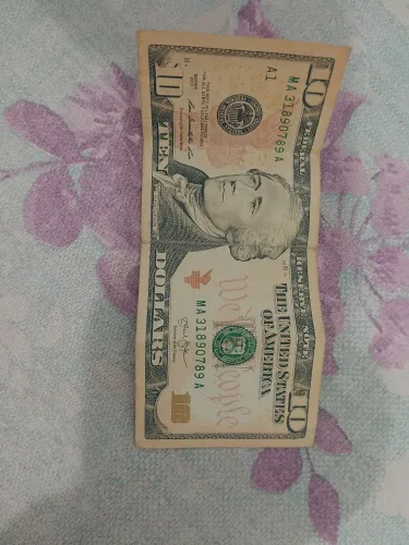 Cédula e moeda antiga