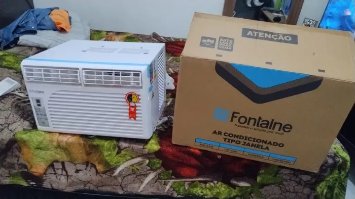 Ar condicionado 10.000 BTUs.. funcionando perfeitamente com nota fiscal e garantia...
